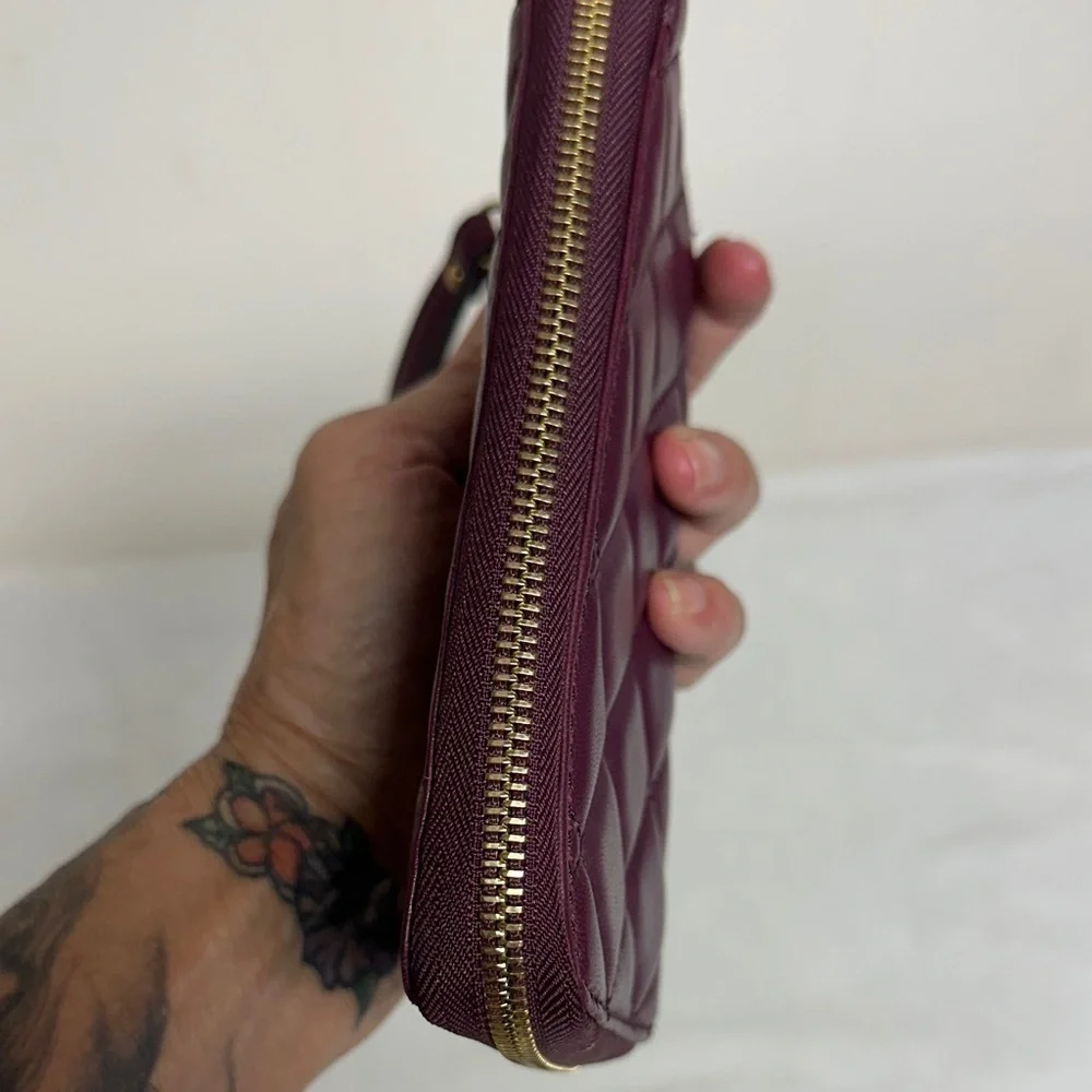 Michael Kors Plum Quilted Wristlet/ wallet